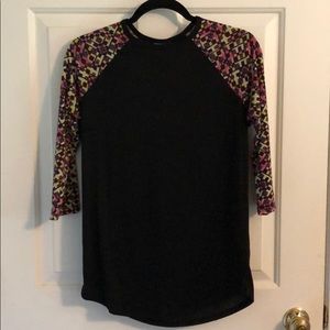 LuLaRoe three-quarter length sleeve shirt.